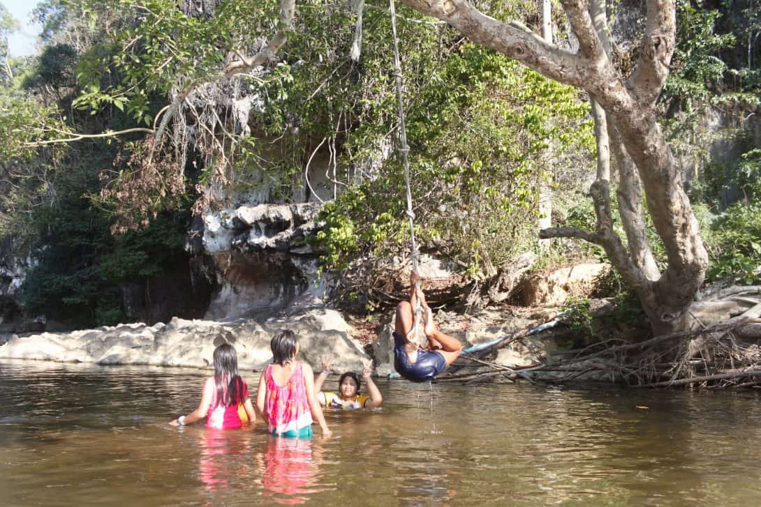 Kids playing in Khao Sok River