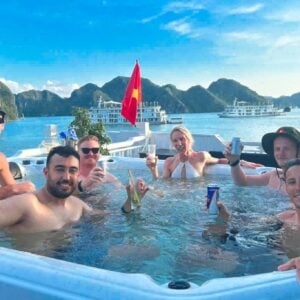 New friends in a jacuzzi on board Oasis Bay Cruise Halong Bay Vietnam